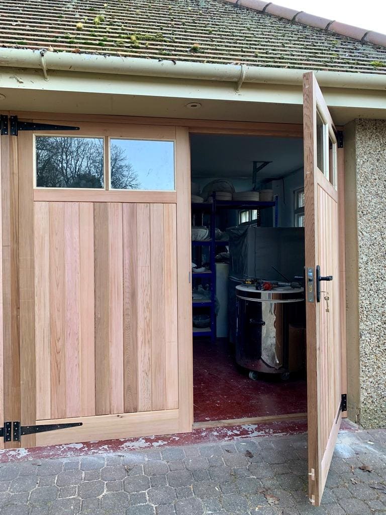 Cedar side-hung garage door, open
