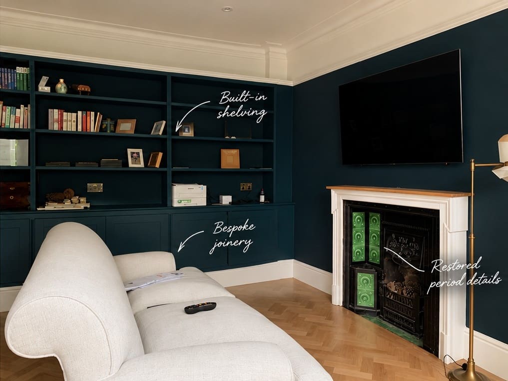 Dark painted fitted library with handwritten notes: built-in shelving, bespoke joinery, restored period details