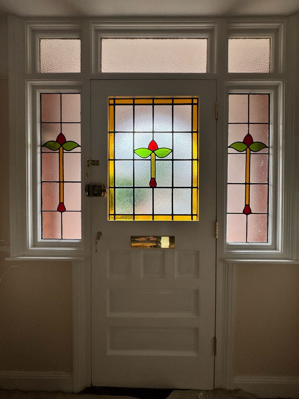 Edwardian front door with leaded glass, sidelights and toplights